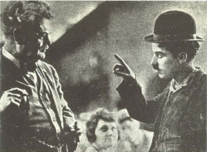 Redmond (left) and Chaplin (right) on the set of A Dog's Left (1918)